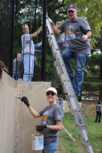 Painting was a large part of the Service Day project. This 200-foot wall was in need of restoration and paint.