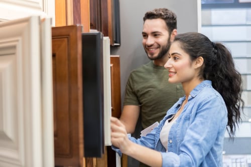 Couple choosing cabinets