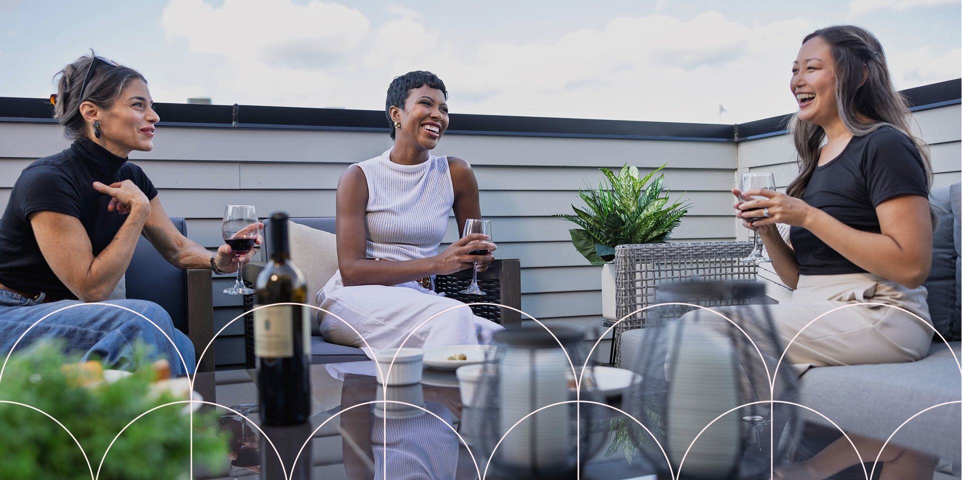women hanging out on rooftop terrace