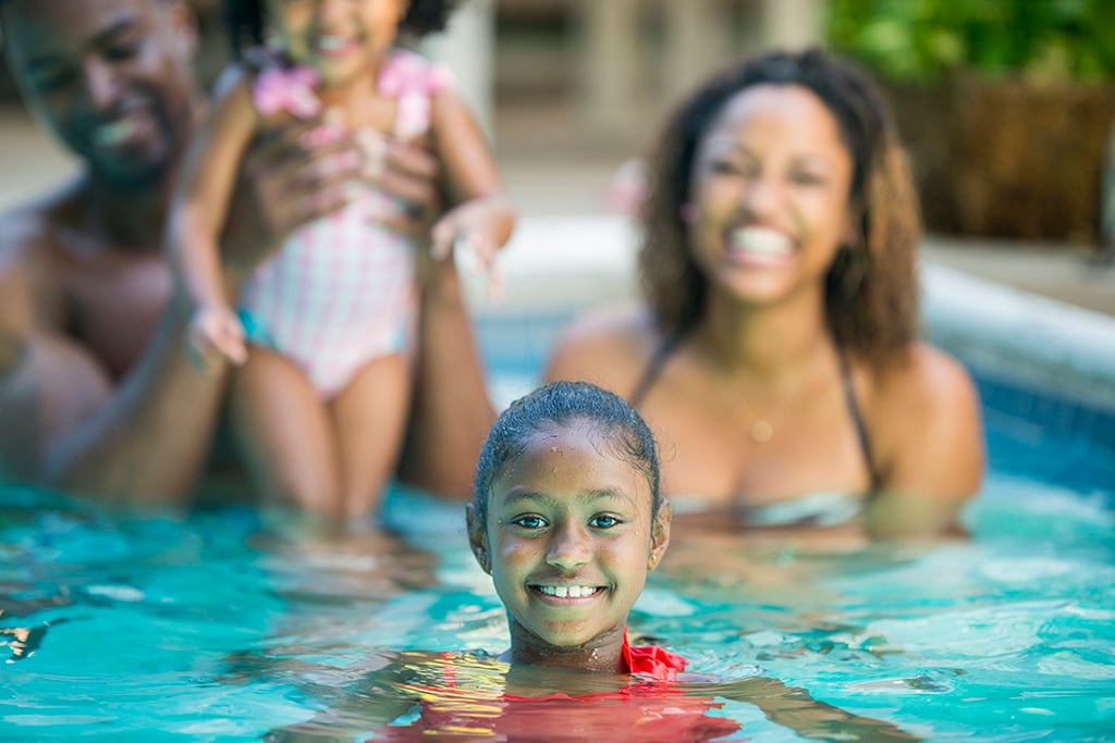EYA_FD_Family Having Fun in Pool wFocus on Young Girl jpeg