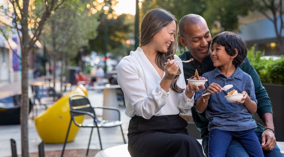 young family eating ice cream