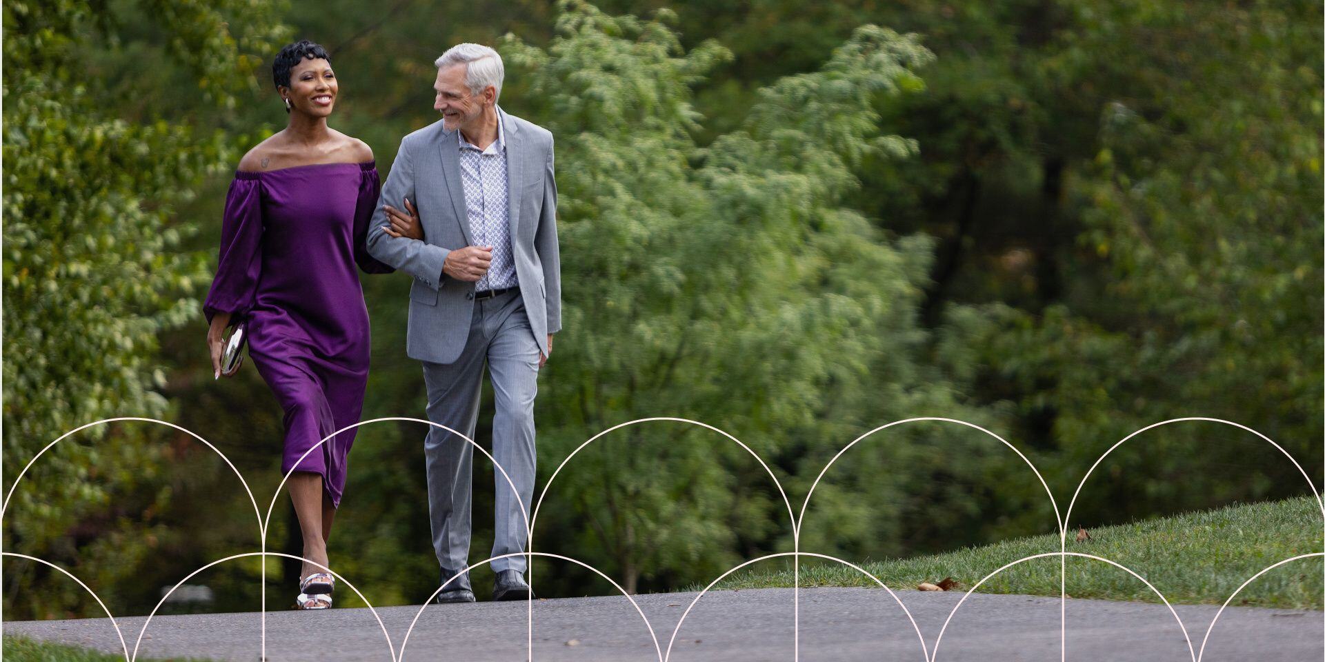 mature couple walking down path on a date to strathmore music hall