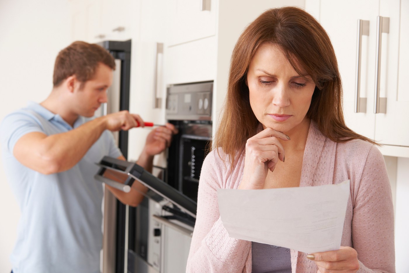 Woman Reviewing Repair Bill