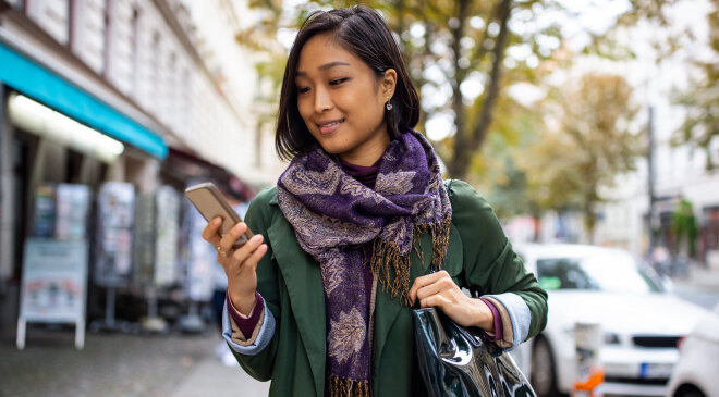 northside-woman-shopping-looking-at-phone