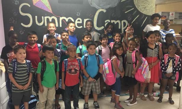 EYA Foundation Donates Backpacks to Montgomery Housing Partnership